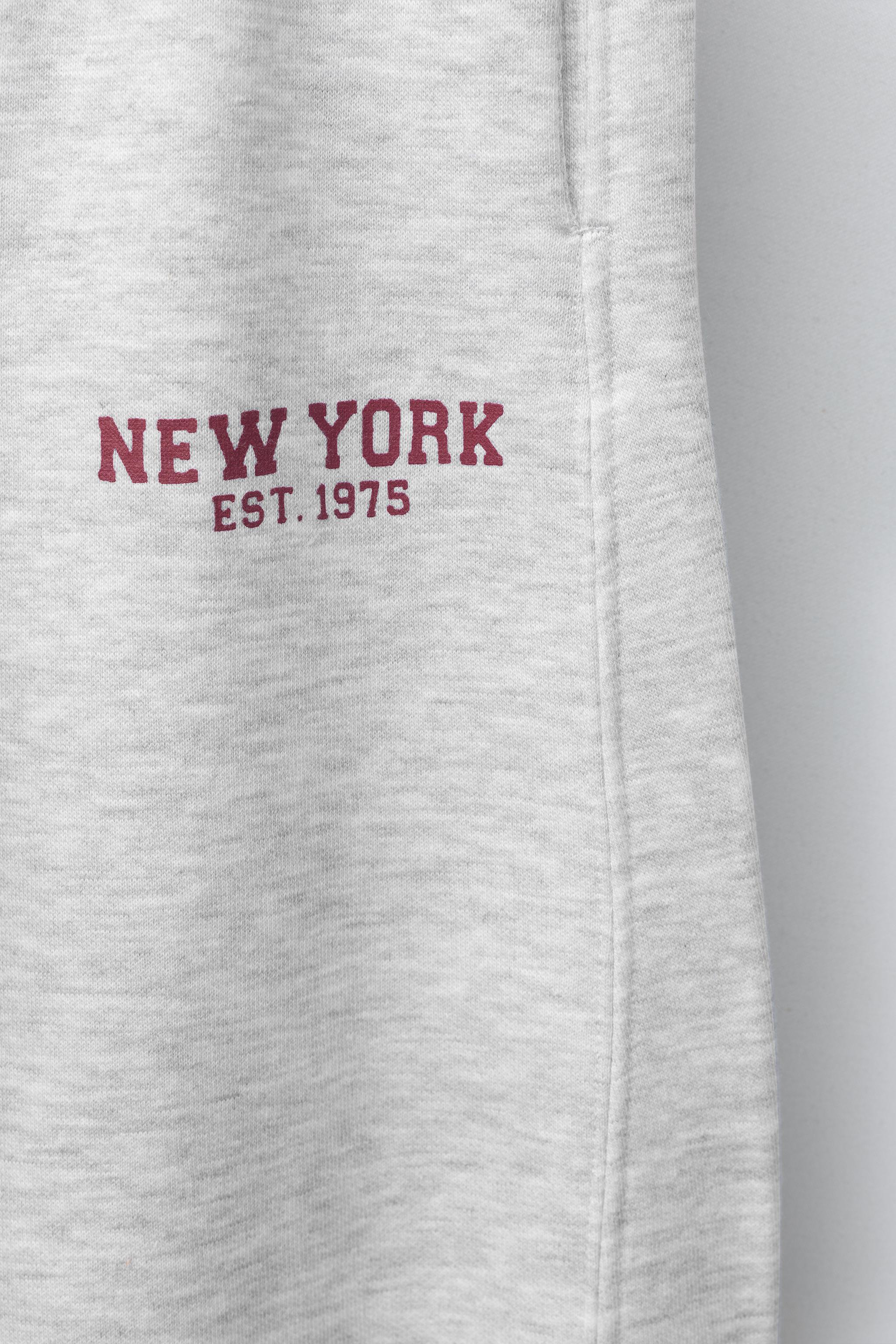 TEXT BARREL SWEATPANTS